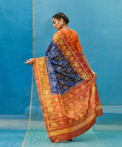 Blue_And_Rust_Handloom_Pure_Mulberry_Silk_Ikat_Patola_Saree_With_Checks_WeaverStory_03