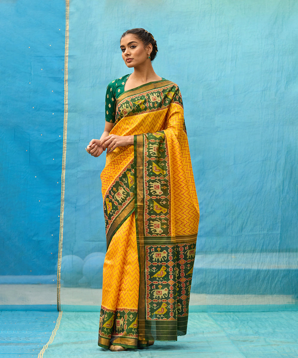 Yellow_And_Green_Handloom_Pure_Mulberry_Silk_Ikat_Patola_Saree_WeaverStory_01