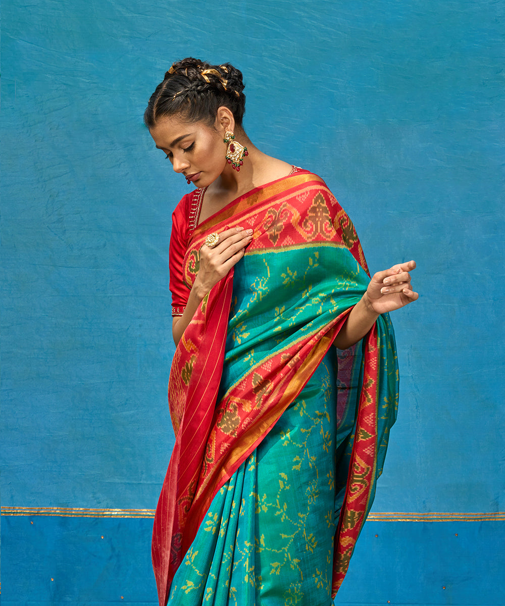 Handloom_Turquoise_Blue_Pure_Mulberry_Silk_Ikat_Patola_Saree_With_Pink_Border_And_Palla_WeaverStory_02
