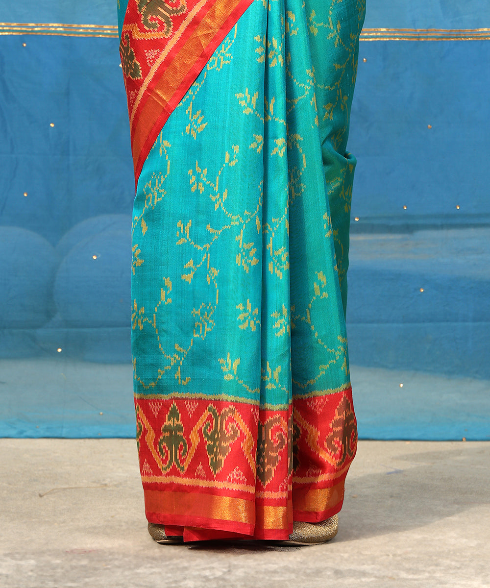 Handloom_Turquoise_Blue_Pure_Mulberry_Silk_Ikat_Patola_Saree_With_Pink_Border_And_Palla_WeaverStory_04