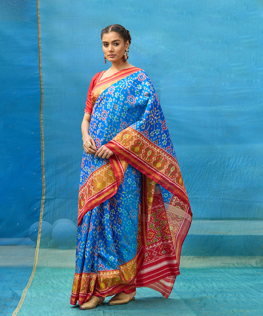 Blue_And_Red_Handloom_Pure_Mulberry_Silk_Ikat_Patola_Saree_With_Tissue_Border_WeaverStory_01