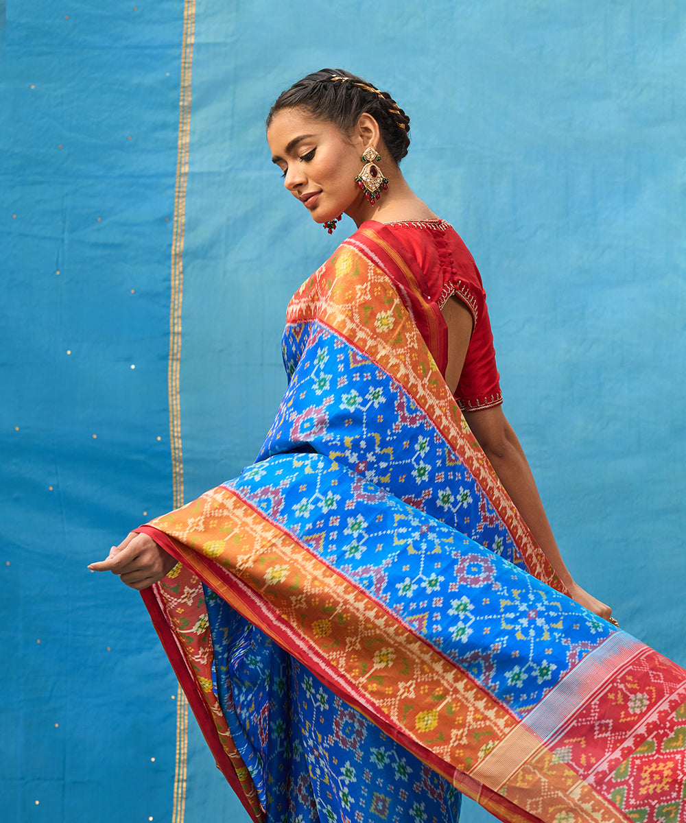 Blue_And_Red_Handloom_Pure_Mulberry_Silk_Ikat_Patola_Saree_With_Tissue_Border_WeaverStory_02