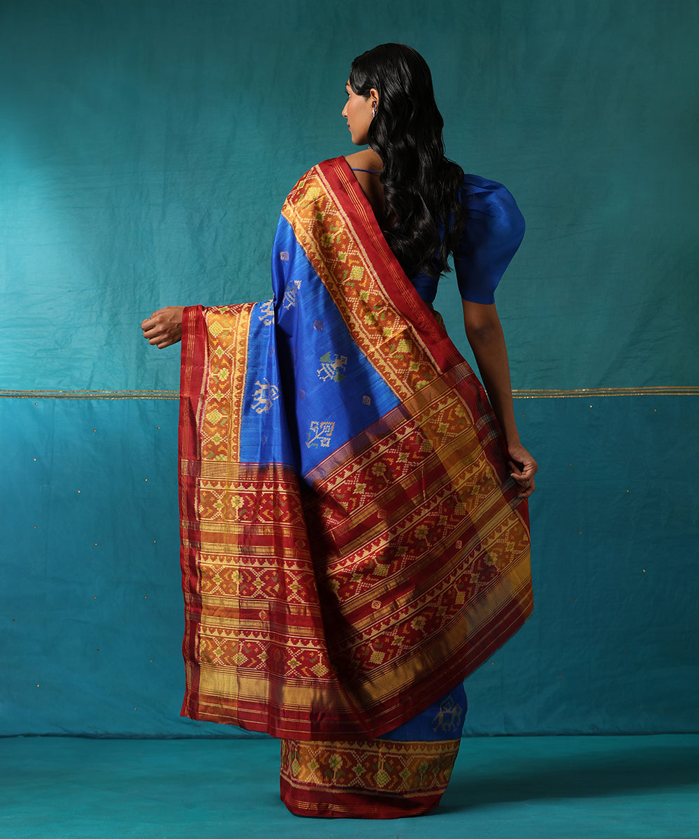 Blue_And_Maroon_Handloom_Pure_Mulberry_Silk_Ikat_Patola_Saree_With_Tissue_Border_WeaverStory03