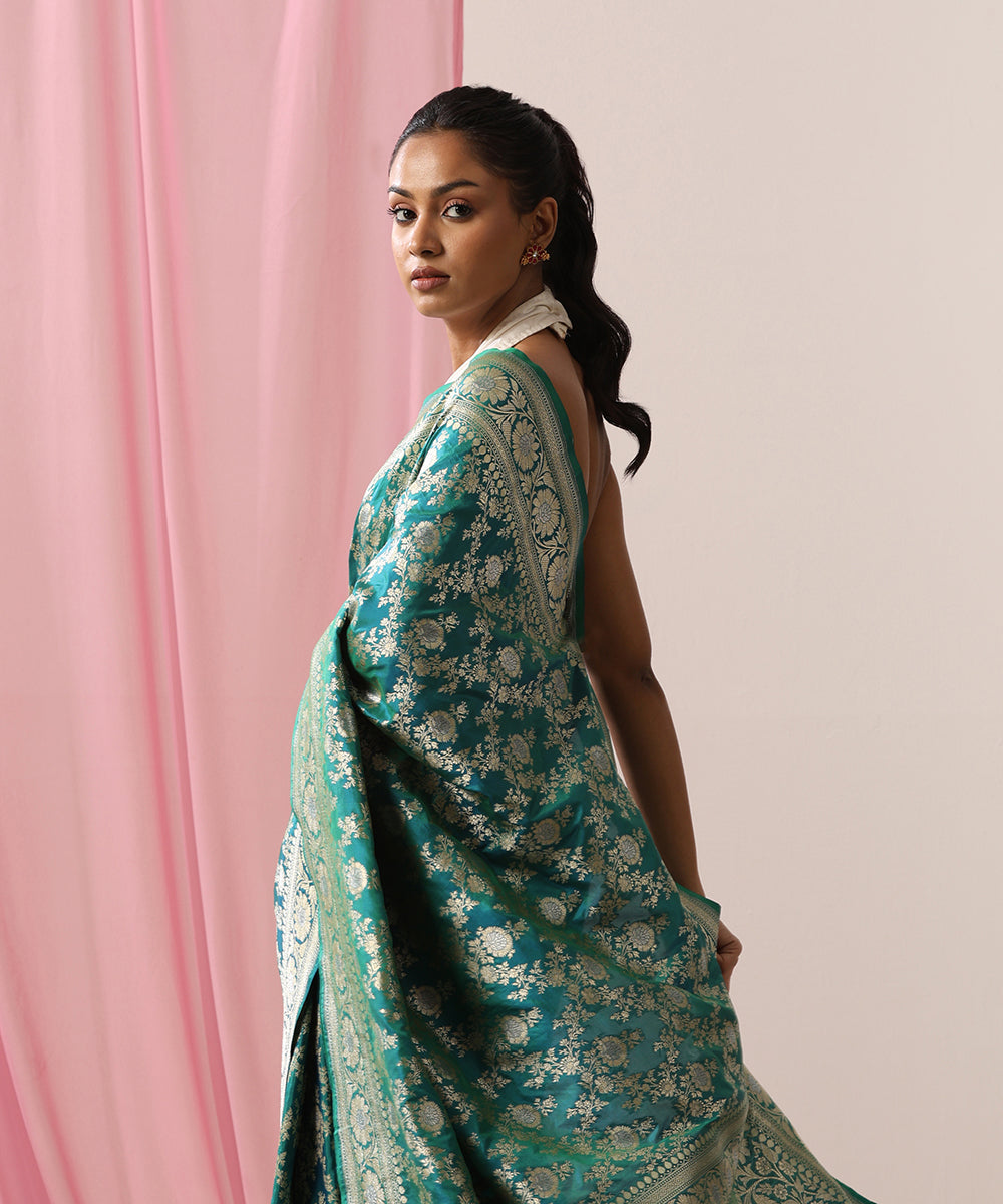 Handloom_Peacock_Blue_Pure_Katan_Silk_Banarasi_Saree_With_Gold_And_Silver_Zari_Floral_Jaal_WeaverStory_01