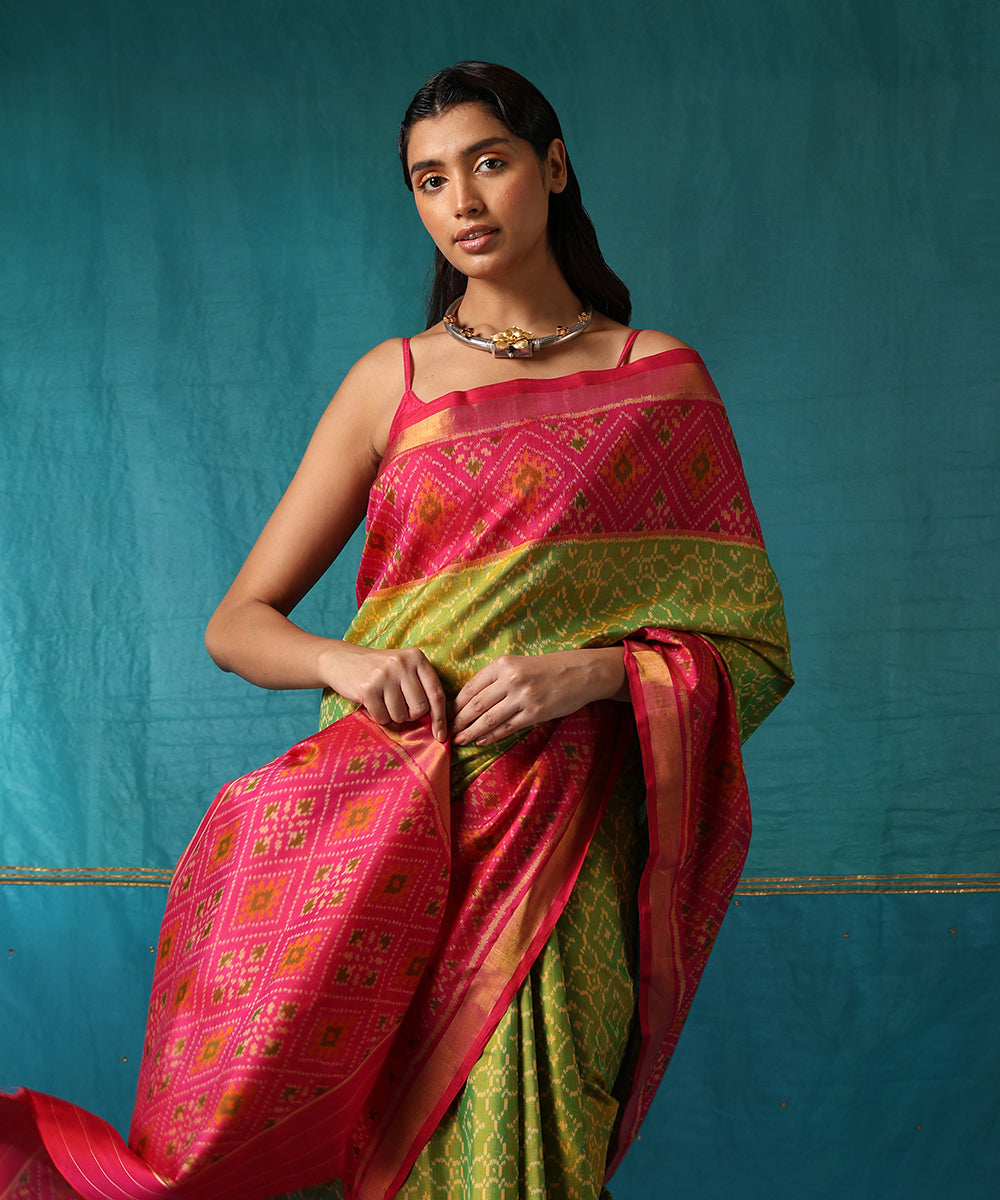Handloom_Green_And_Pink_Pure_Mulberry_Silk_Ikat_Patola_Saree_With_Pink_Border_WeaverStory01