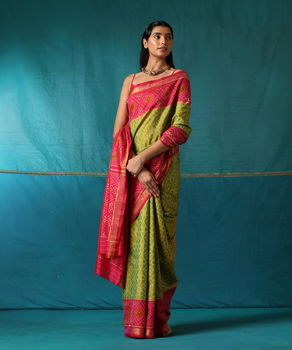 Handloom_Green_And_Pink_Pure_Mulberry_Silk_Ikat_Patola_Saree_With_Pink_Border_WeaverStory02