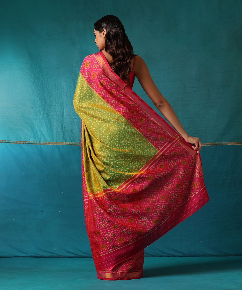 Handloom_Green_And_Pink_Pure_Mulberry_Silk_Ikat_Patola_Saree_With_Pink_Border_WeaverStory03