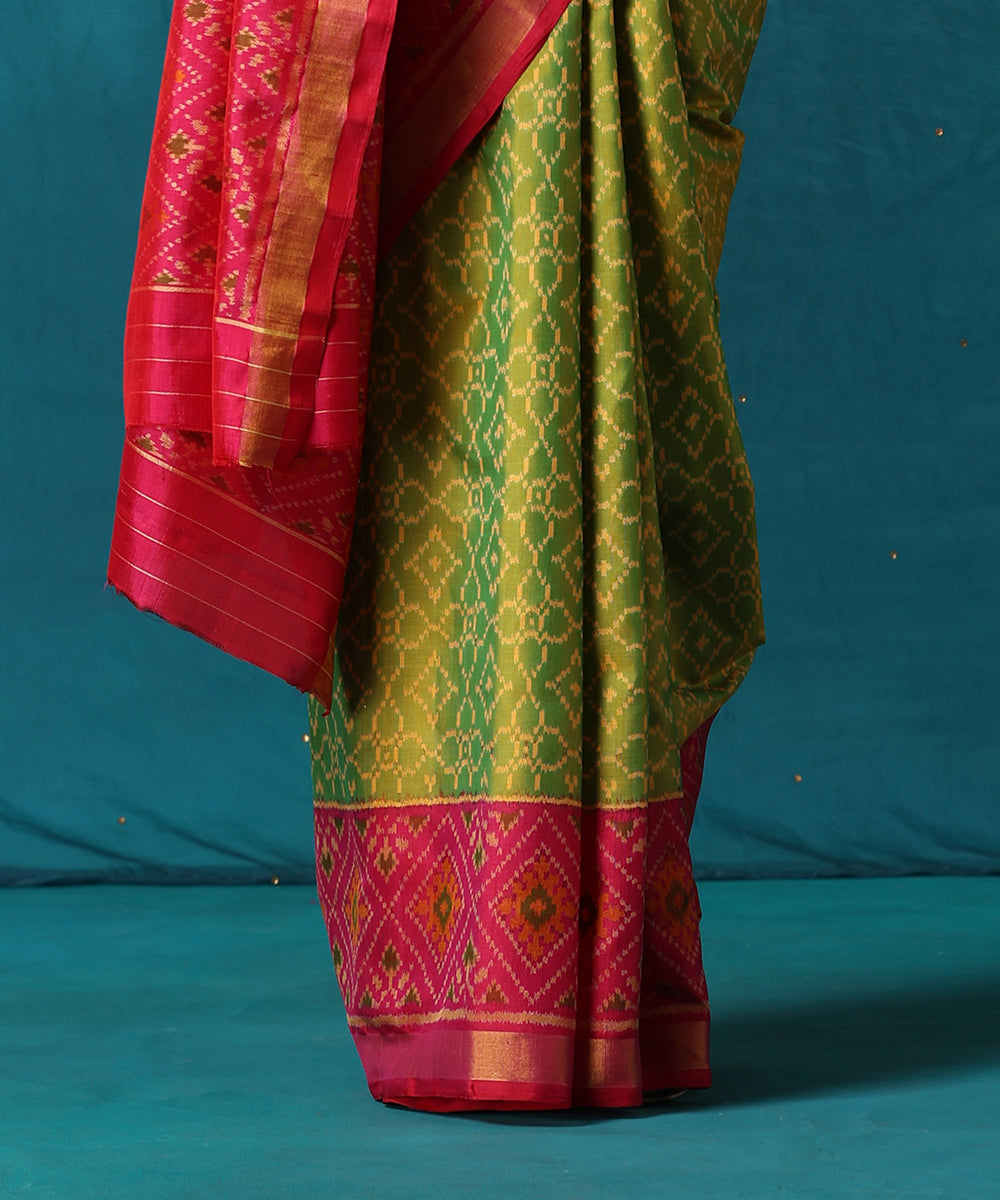 Handloom_Green_And_Pink_Pure_Mulberry_Silk_Ikat_Patola_Saree_With_Pink_Border_WeaverStory04