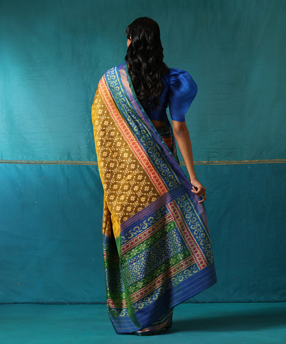 Mustard_Handloom_Pure_Mulberry_Silk_Ikat_Patola_Saree_With_Blue_Border_WeaverStory03