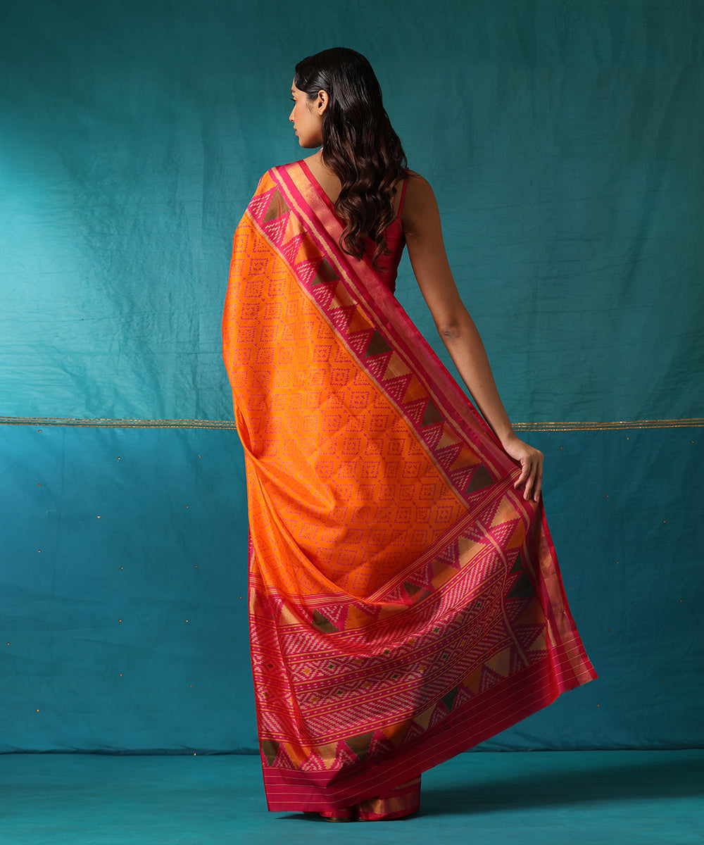 Orange_And_Pink_Handloom_Pure_Mulberry_Silk_Ikat_Patola_Saree_With_Pink_Temple_Border_WeaverStory03