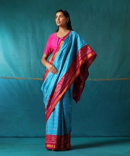 Turquoise_Handloom_Pure_Mulberry_Silk_Ikat_Patola_Saree_With_Pink_Border_WeaverStory02