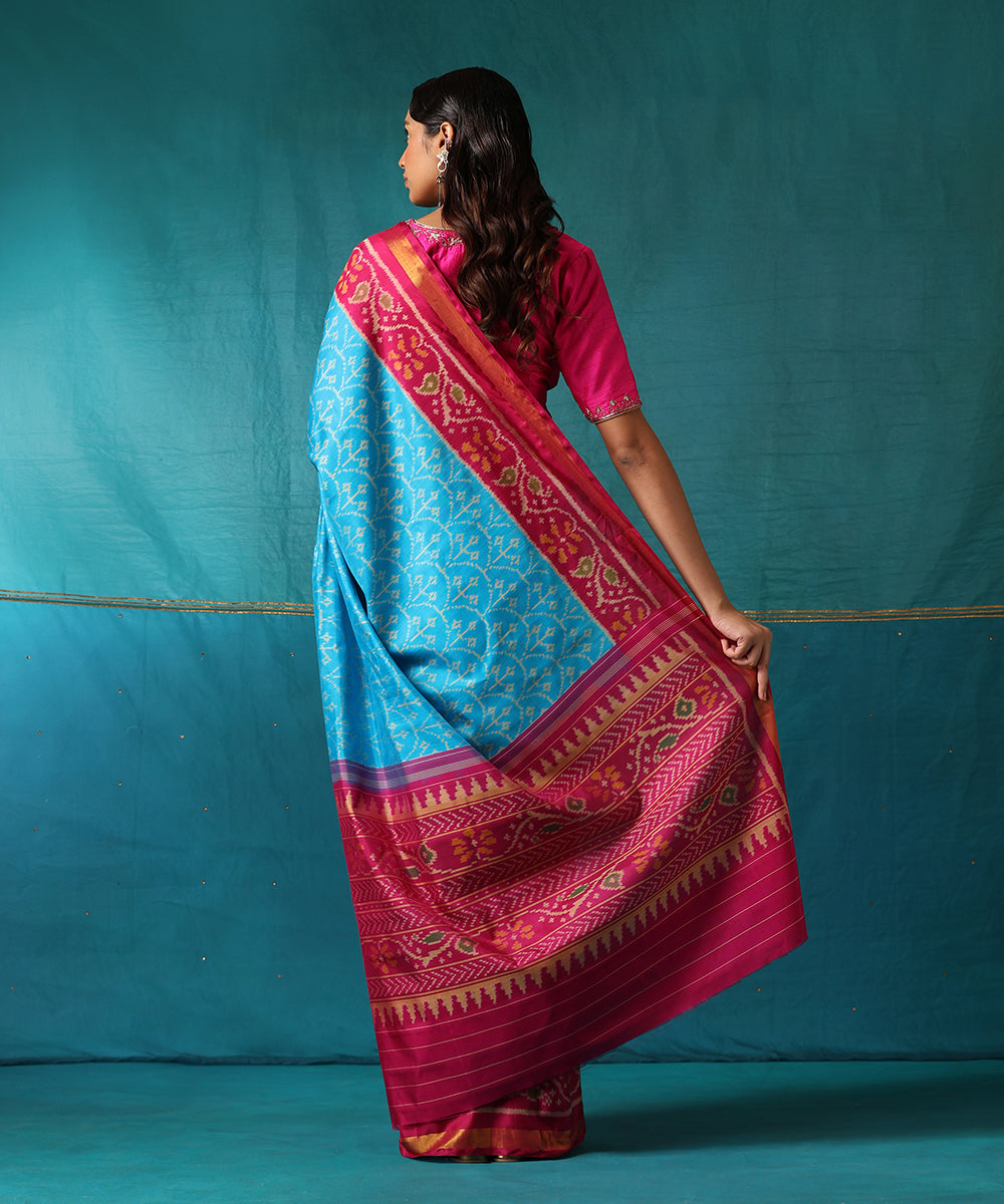 Turquoise_Handloom_Pure_Mulberry_Silk_Ikat_Patola_Saree_With_Pink_Border_WeaverStory03