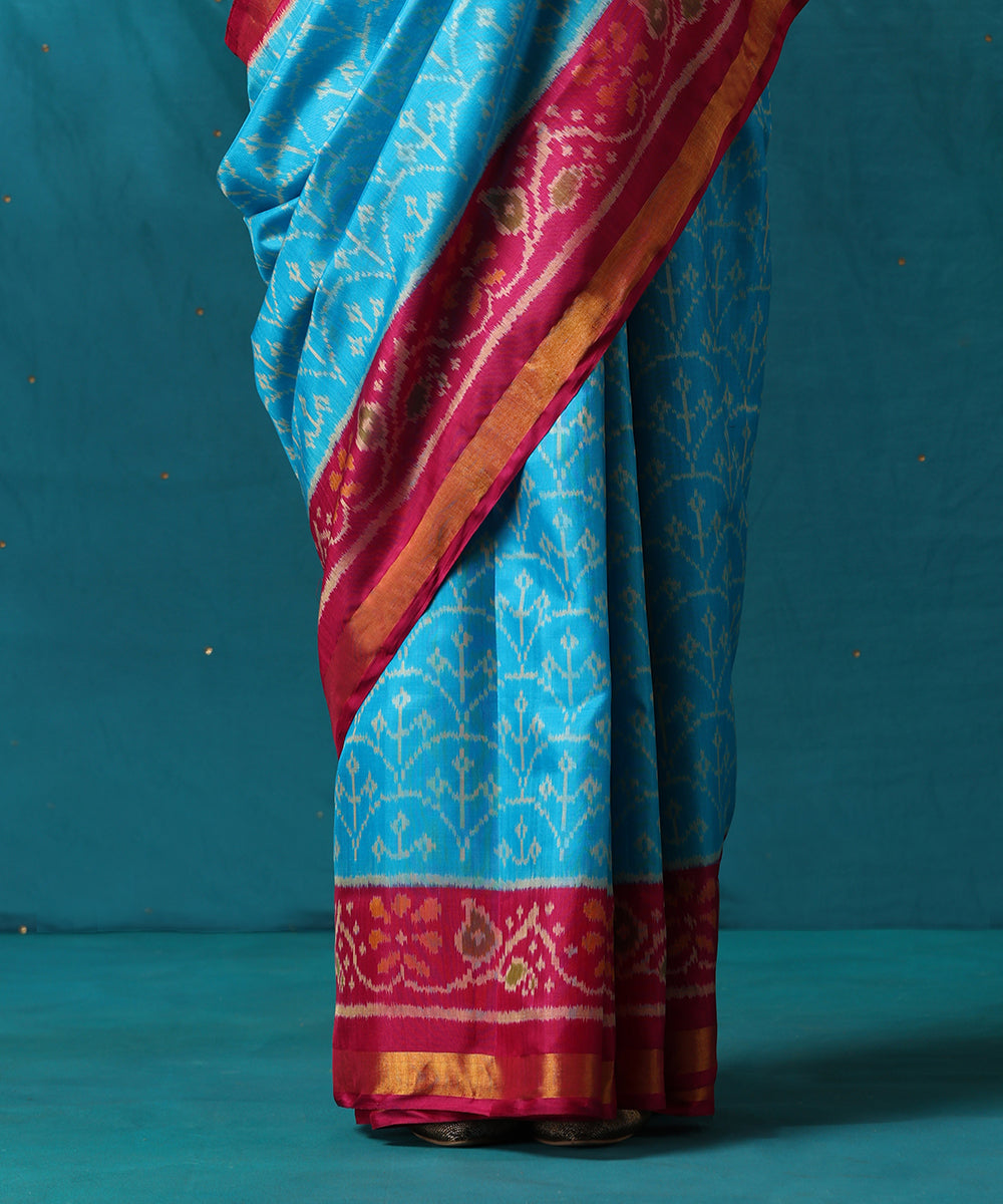 Turquoise_Handloom_Pure_Mulberry_Silk_Ikat_Patola_Saree_With_Pink_Border_WeaverStory04