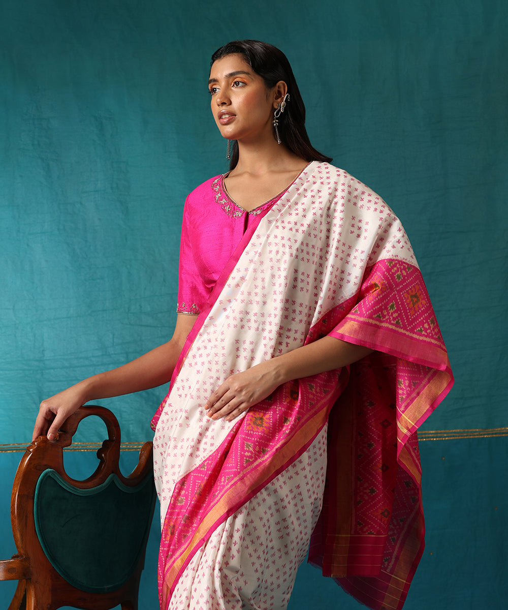 White_And_Pink_Handloom_Pure_Mulberry_Silk_Ikat_Patola_Saree_With_Pink_Border_WeaverStory01