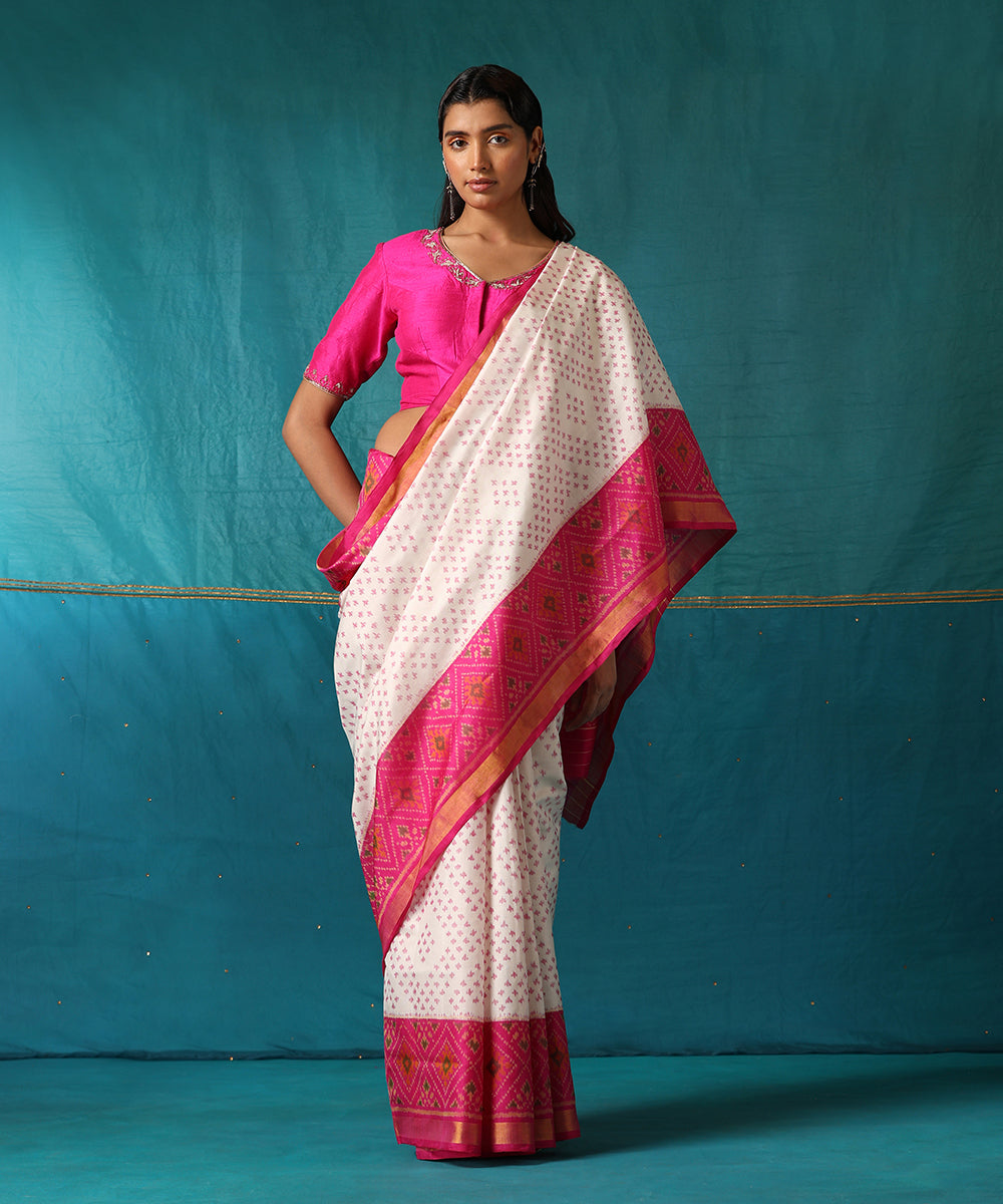 White_And_Pink_Handloom_Pure_Mulberry_Silk_Ikat_Patola_Saree_With_Pink_Border_WeaverStory02