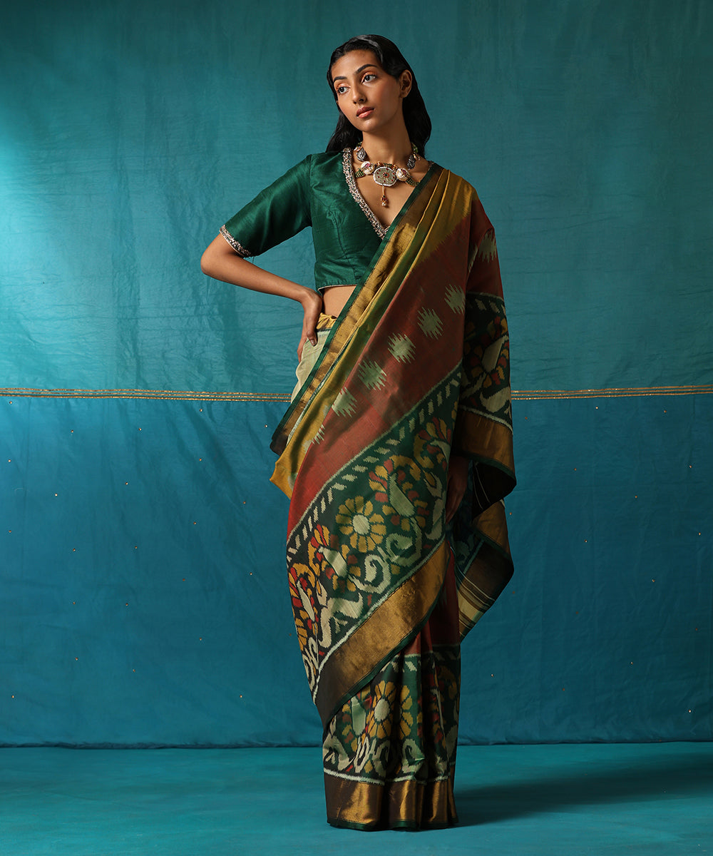 Mustard_And_Green_Handloom_Pure_Mulberry_Silk_Ikat_Patola_Saree_With_Broad_Floral_Border_WeaverStory02
