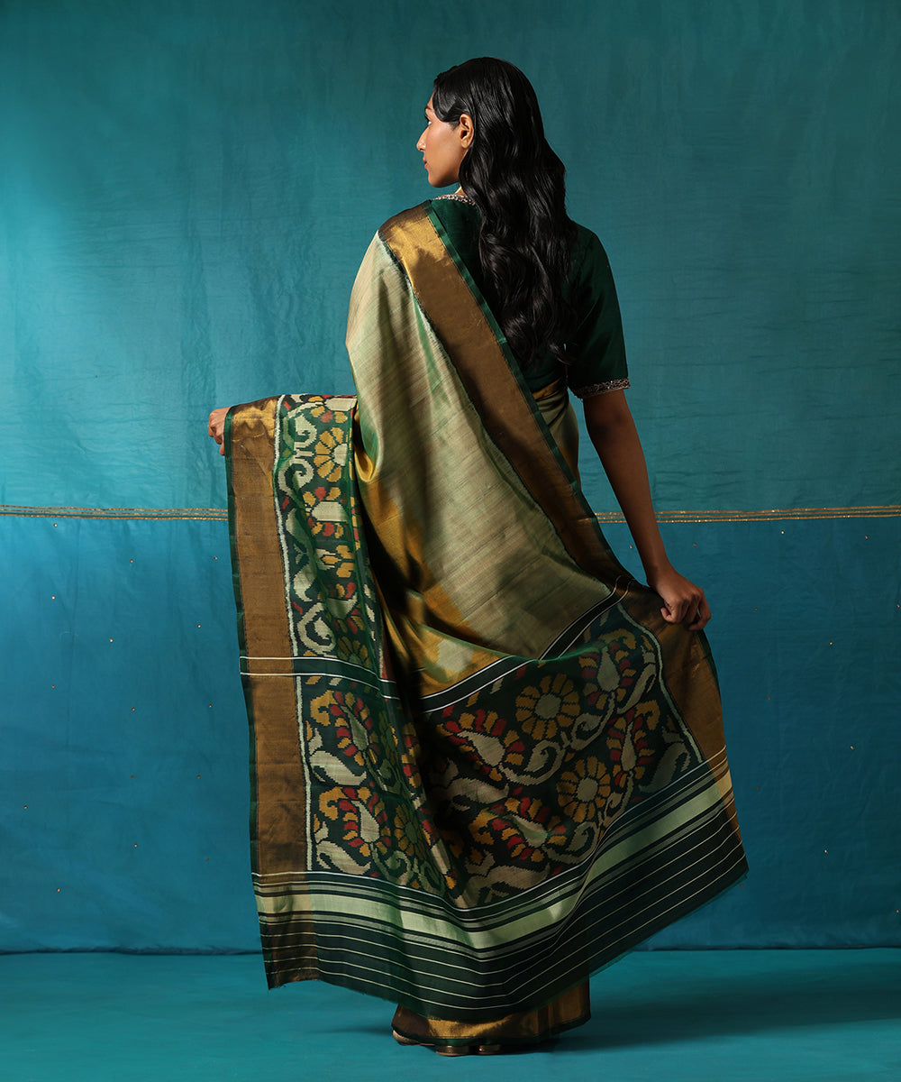 Mustard_And_Green_Handloom_Pure_Mulberry_Silk_Ikat_Patola_Saree_With_Broad_Floral_Border_WeaverStory03