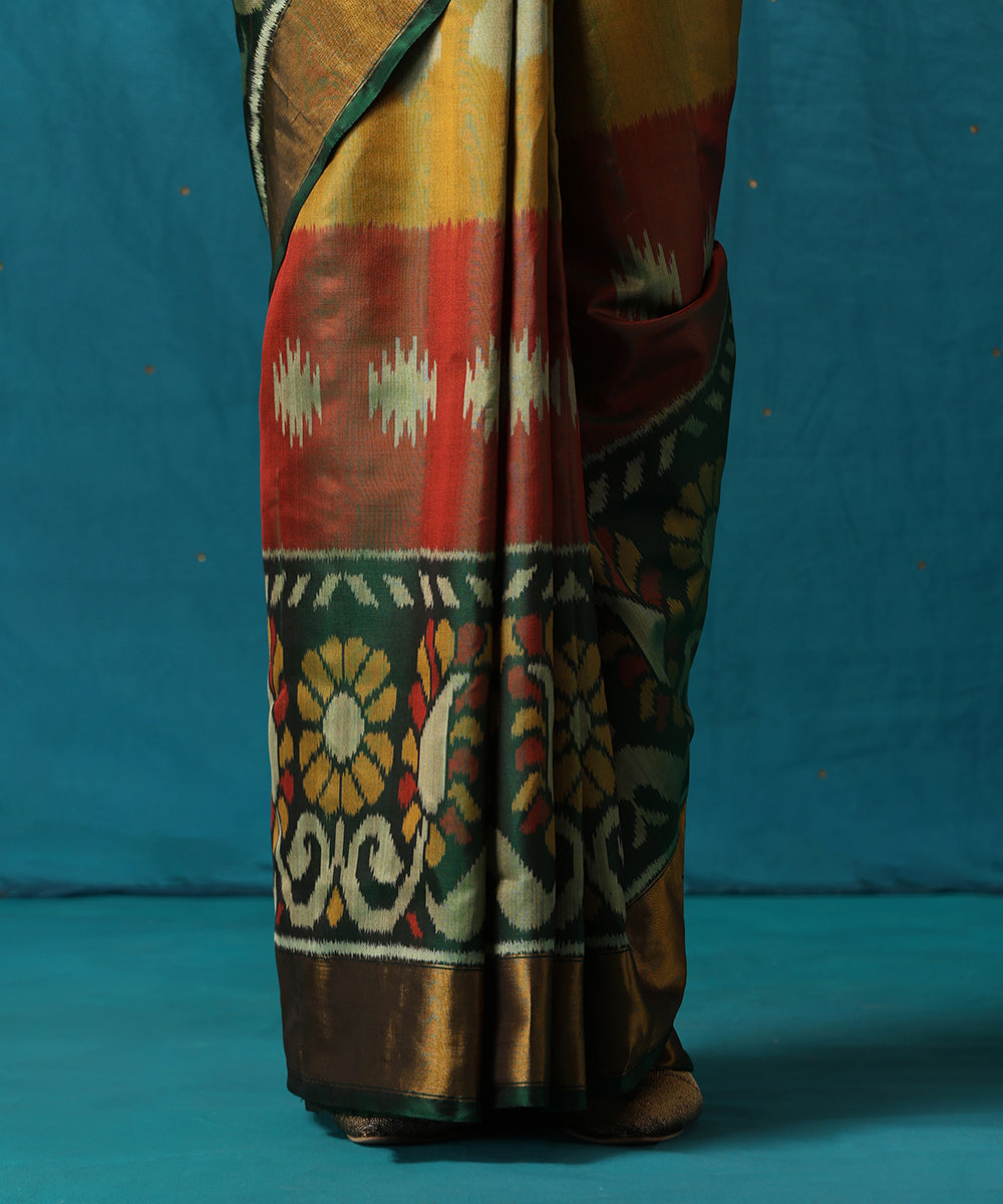 Mustard_And_Green_Handloom_Pure_Mulberry_Silk_Ikat_Patola_Saree_With_Broad_Floral_Border_WeaverStory04