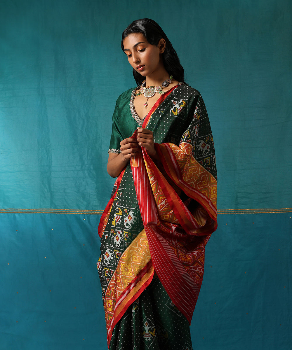 Handloom_Green_And_Red_Pure_Mulberry_Silk_Ikat_Patola_Saree_WeaverStory01