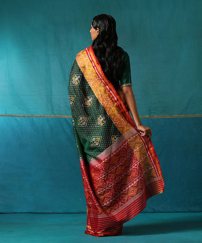 Handloom_Green_And_Red_Pure_Mulberry_Silk_Ikat_Patola_Saree_WeaverStory03