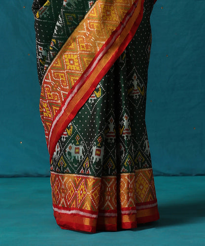 Handloom_Green_And_Red_Pure_Mulberry_Silk_Ikat_Patola_Saree_WeaverStory04