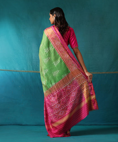 Handloom_Parrot_Green_And_Pink_Pure_Mulberry_Silk_Ikat_Patola_Saree_With_Tree_Motifs_WeaverStory03