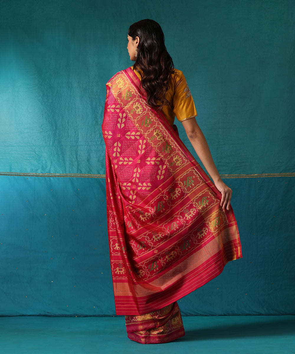 Magenta_Handloom_Pure_Mulberry_Silk_Ikat_Patola_Saree_With_Elephant_Border_WeaverStory03