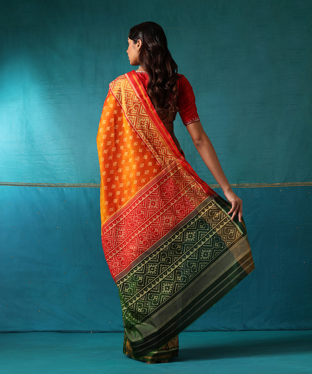 Red_And_Orange_Handloom_Pure_Mulberry_Silk_Ikat_Patola_Saree_With_Green_Geometrical_Border_WeaverStory03