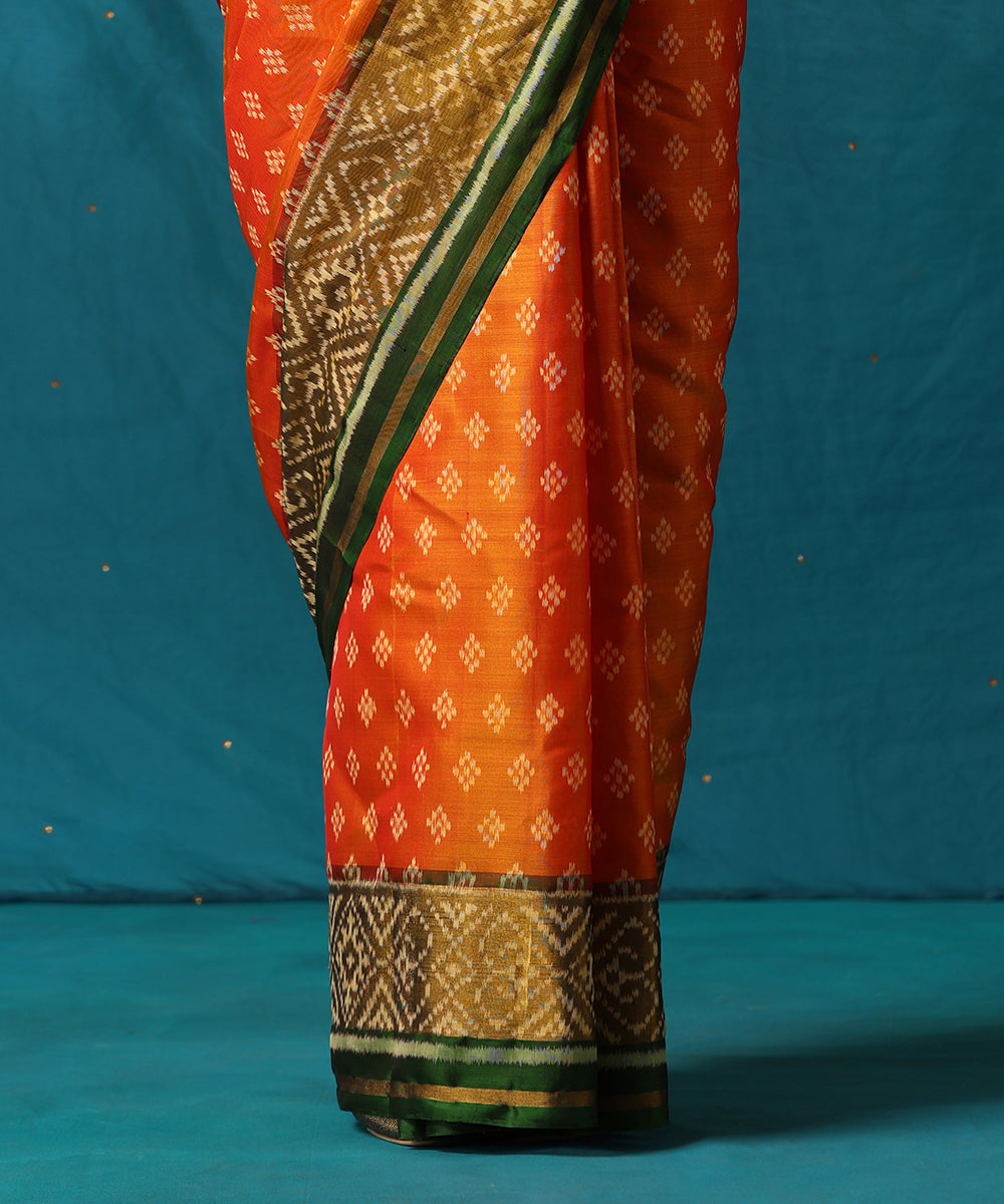 Red_And_Orange_Handloom_Pure_Mulberry_Silk_Ikat_Patola_Saree_With_Green_Geometrical_Border_WeaverStory04