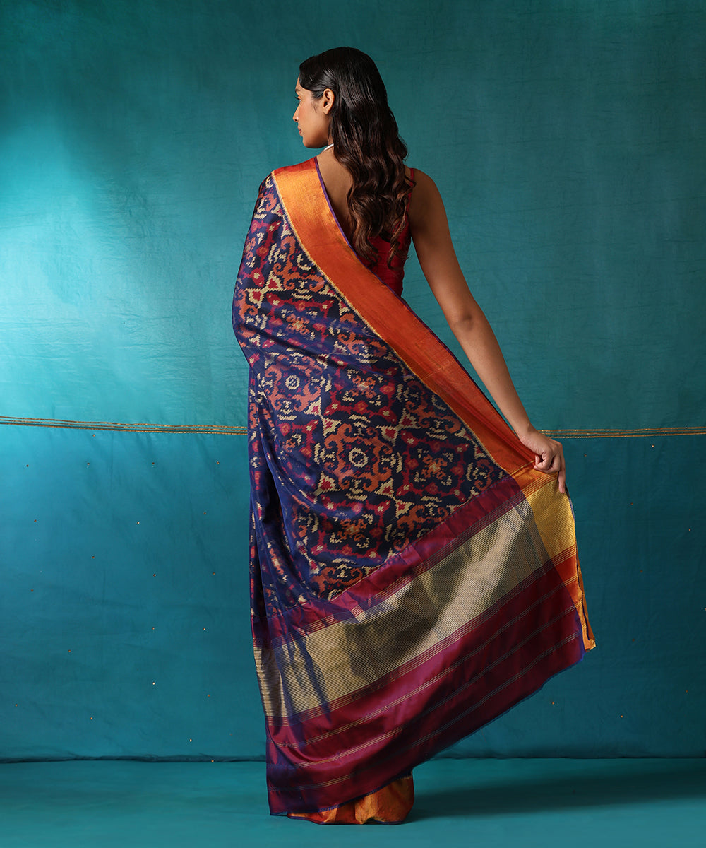 Blue_And_Wine_Handloom_Pure_Mulberry_Silk_Ikat_Patola_Saree_With_Zari_Border_WeaverStory03