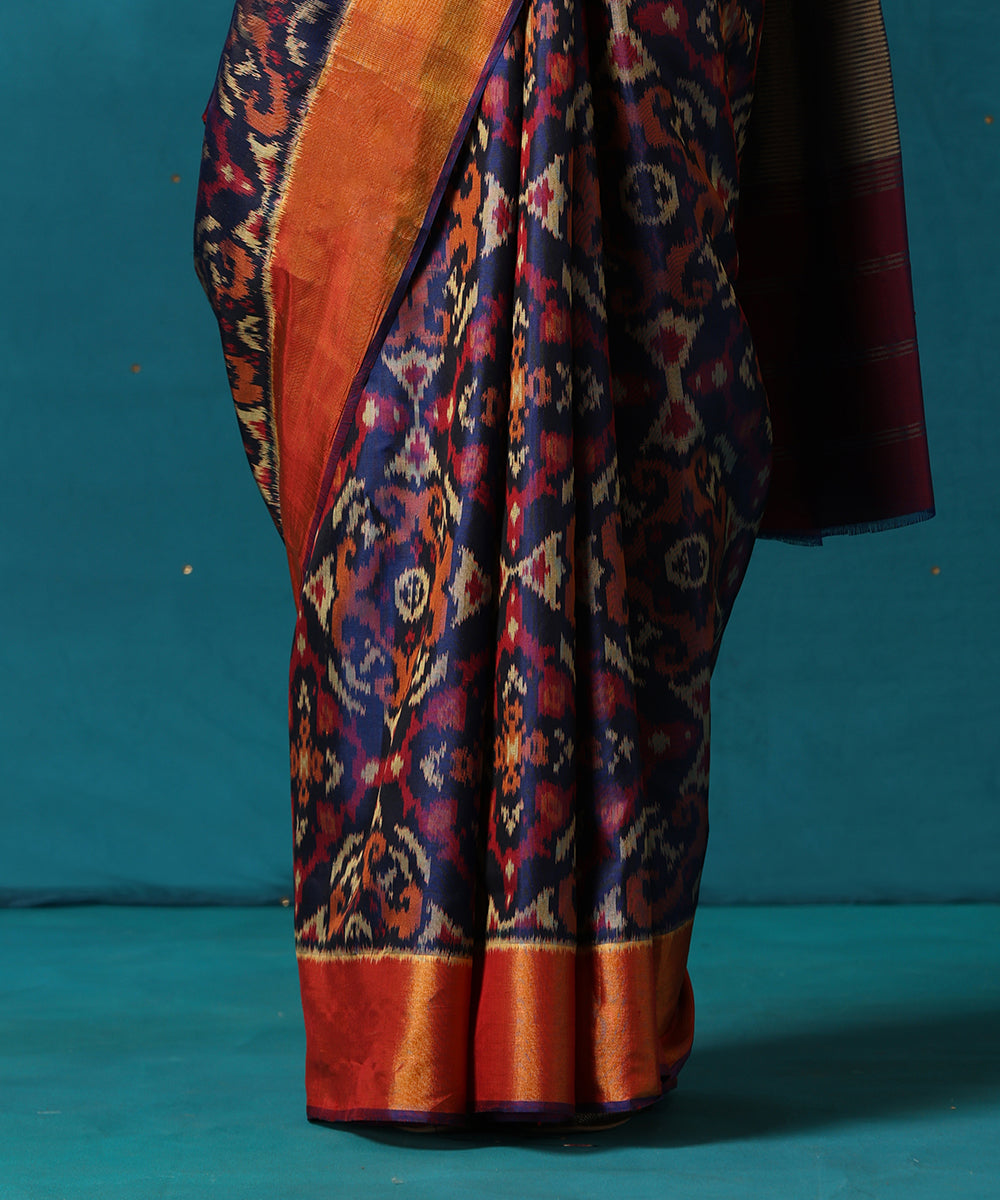 Blue_And_Wine_Handloom_Pure_Mulberry_Silk_Ikat_Patola_Saree_With_Zari_Border_WeaverStory04