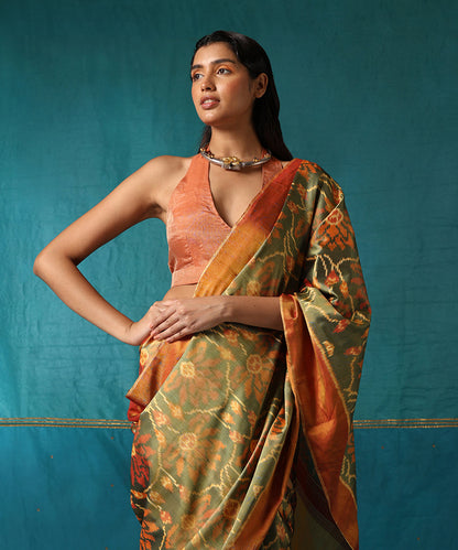 Handloom_Green_And_Mustard_Pure_Mulberry_Silk_Ikat_Patola_Saree_With_Big_Flower_Jaal_WeaverStory01