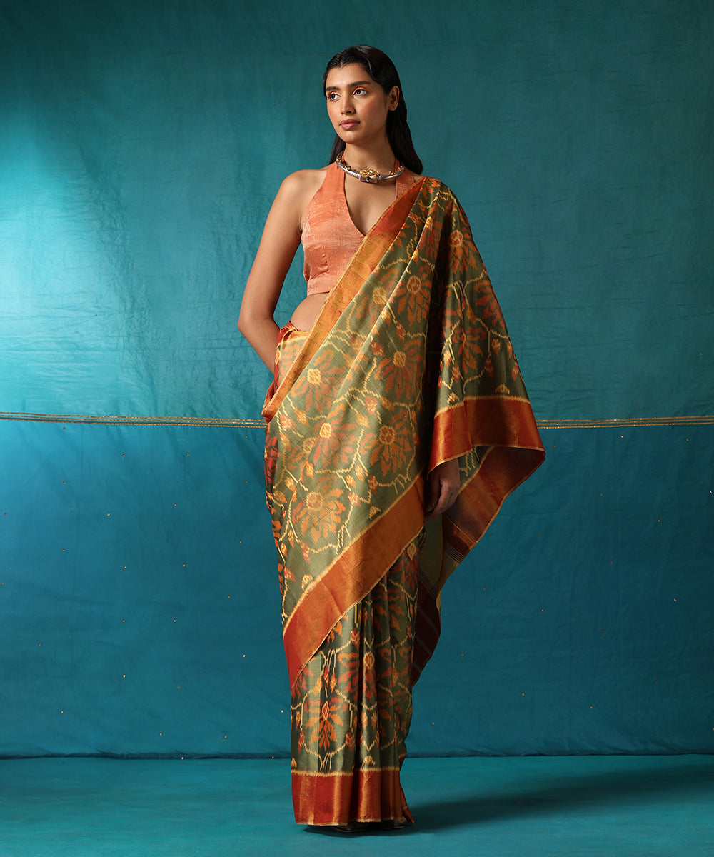 Handloom_Green_And_Mustard_Pure_Mulberry_Silk_Ikat_Patola_Saree_With_Big_Flower_Jaal_WeaverStory02