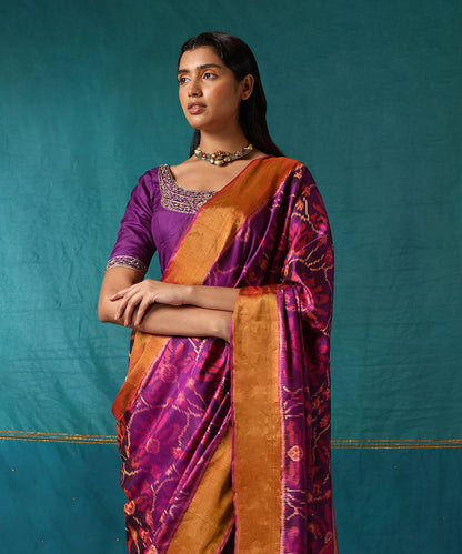 Purple_And_Pink_Handloom_Pure_Mulberry_Silk_Ikat_Patola_Saree_With_Zari_Border_WeaverStory01