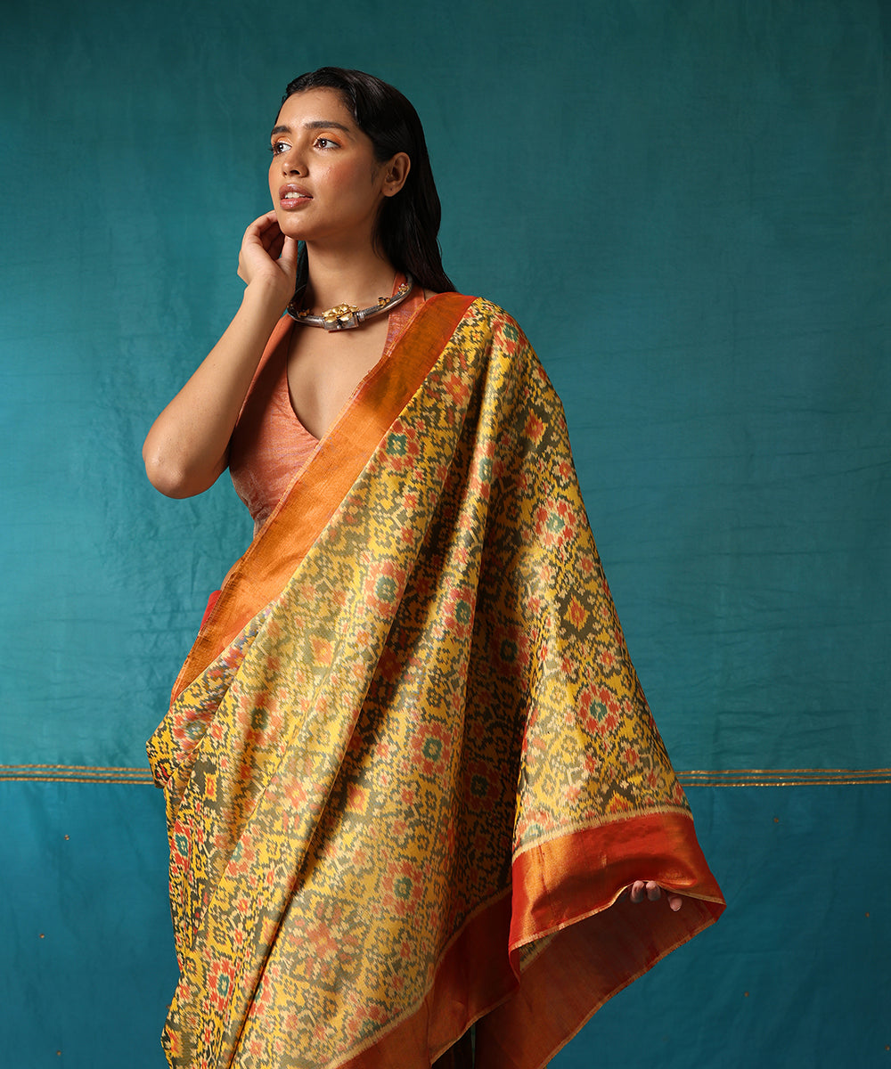 Green_And_Yellow_Dual_Tone_Handloom_Pure_Mulberry_Silk_Ikat_Patola_Saree_WeaverStory01