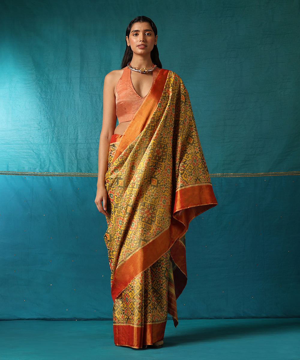 Green_And_Yellow_Dual_Tone_Handloom_Pure_Mulberry_Silk_Ikat_Patola_Saree_WeaverStory02