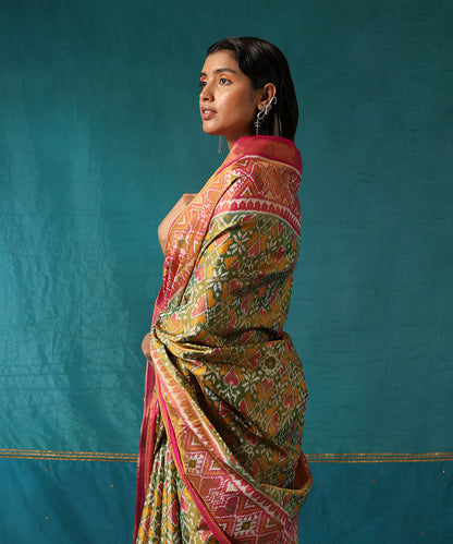 Green_And_Pink_Handloom_Pure_Mulberry_Tissue_Silk_Ikat_Patola_Saree_WeaverStory01