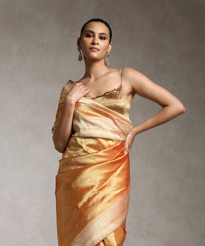 Orange_And_Gold_Handloom_Pure_Katan_Silk_Zari_Tanchoi_Banarasi_Saree_WeaverStory_02