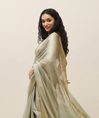 Handloom_Peach_And_Green_Stripe_Pure_Cotton_Silk_Chanderi_Saree_With_Golden_Border_WeaverStory_01