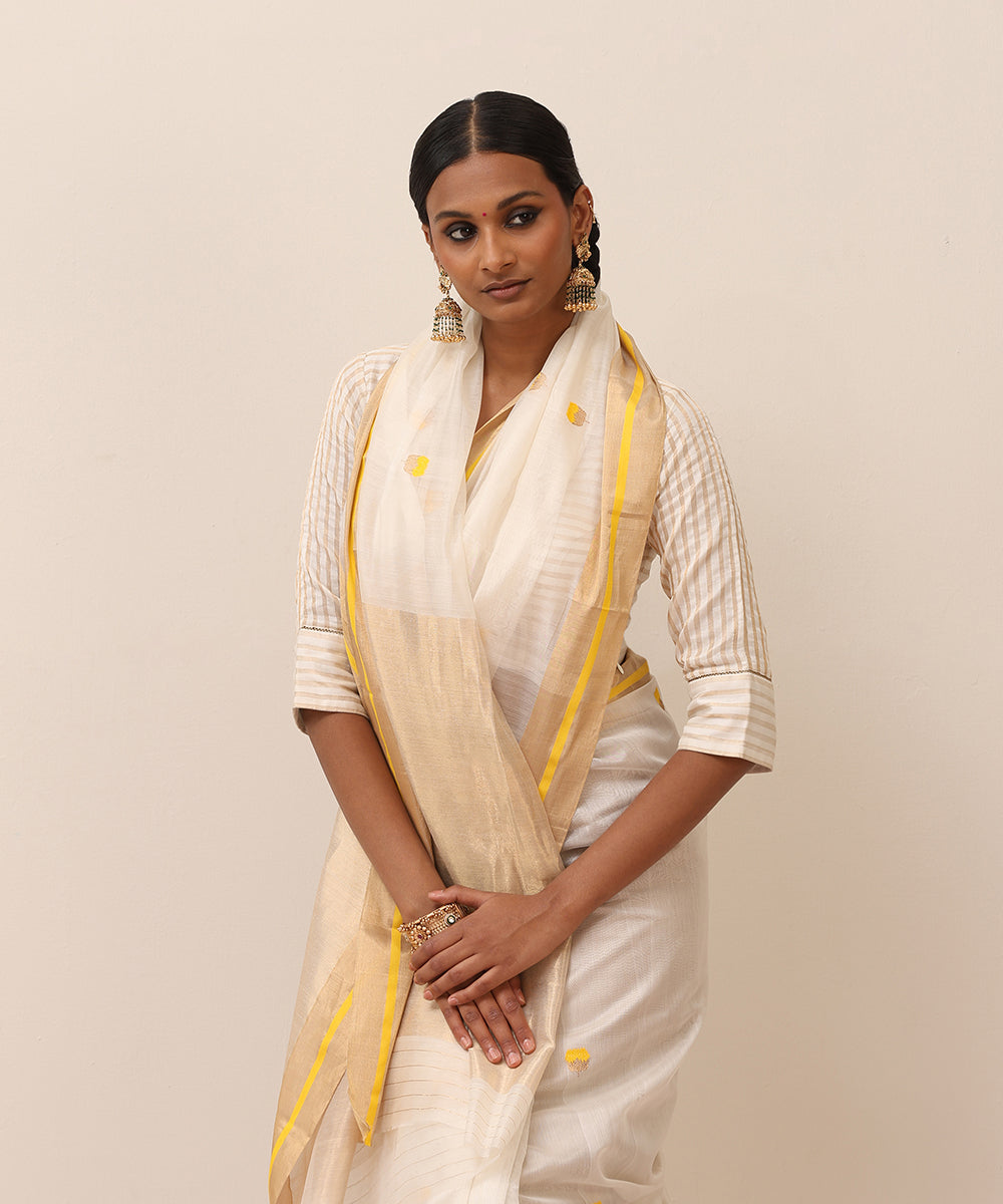 White_Handloom_Pure_Cotton_Chanderi_Saree_With_Yellow_Gainda_Boota_And_Golden_Border_WeaverStory_01