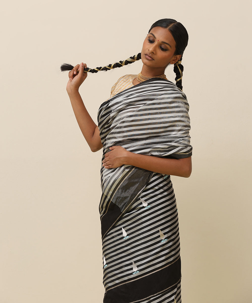 Grey_And_Black_Handloom_Stripes_Pure_Silk_Chanderi_Saree_With_And_Eknaliya_Silver_Boota_And_Blue_Leaf_WeaverStory_01