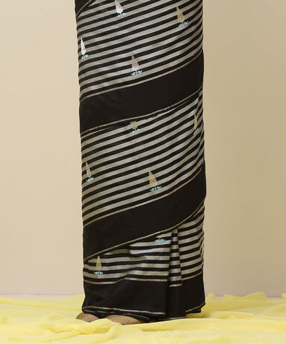 Grey_And_Black_Handloom_Stripes_Pure_Silk_Chanderi_Saree_With_And_Eknaliya_Silver_Boota_And_Blue_Leaf_WeaverStory_04