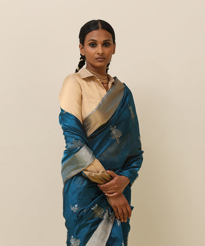 Teal_Blue_Handloom_Pure_Silk_Chanderi_Saree_With_Eknaliya_Geometric_Motif_And_Golden_Border_WeaverStory_01