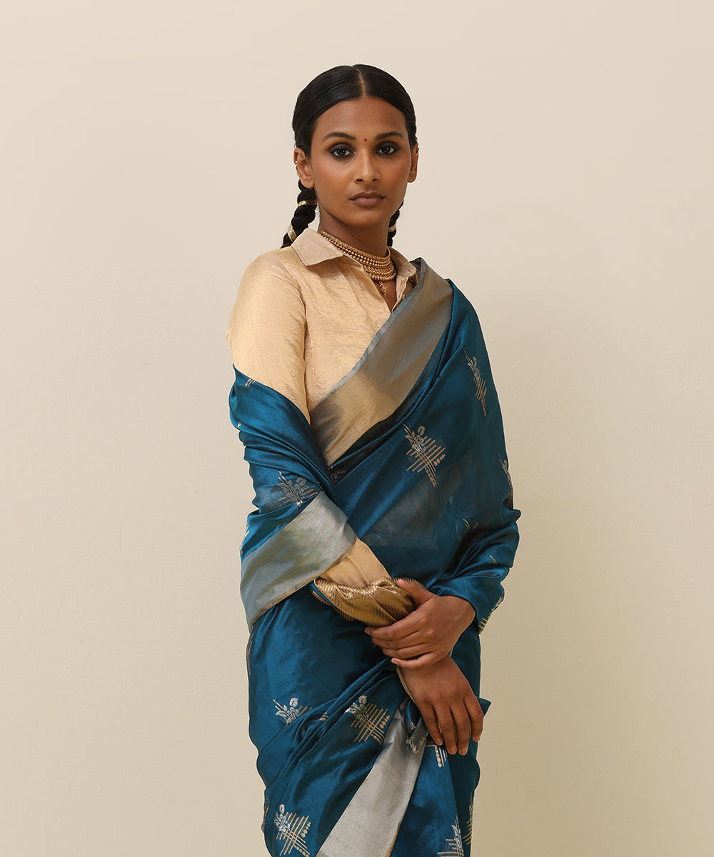 Handloom_Teal_Blue_Pure_Silk_Chanderi_Saree_With_Floral_Motif_And_Golden_Border_WeaverStory_01