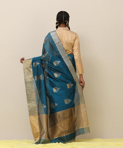 Handloom_Teal_Blue_Pure_Silk_Chanderi_Saree_With_Floral_Motif_And_Golden_Border_WeaverStory_03