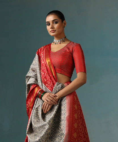 Handloom_Grey_Pure_Mulberry_Silk_Ikat_Patola_Saree_With_Red_Border_And_Palla_WeaverStory_01