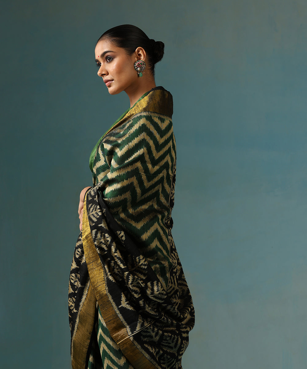 Handloom_Green_Pure_Raw_Silk_Ikat_Patola_Saree_With_black_Border_And_Palla_WeaverStory_01