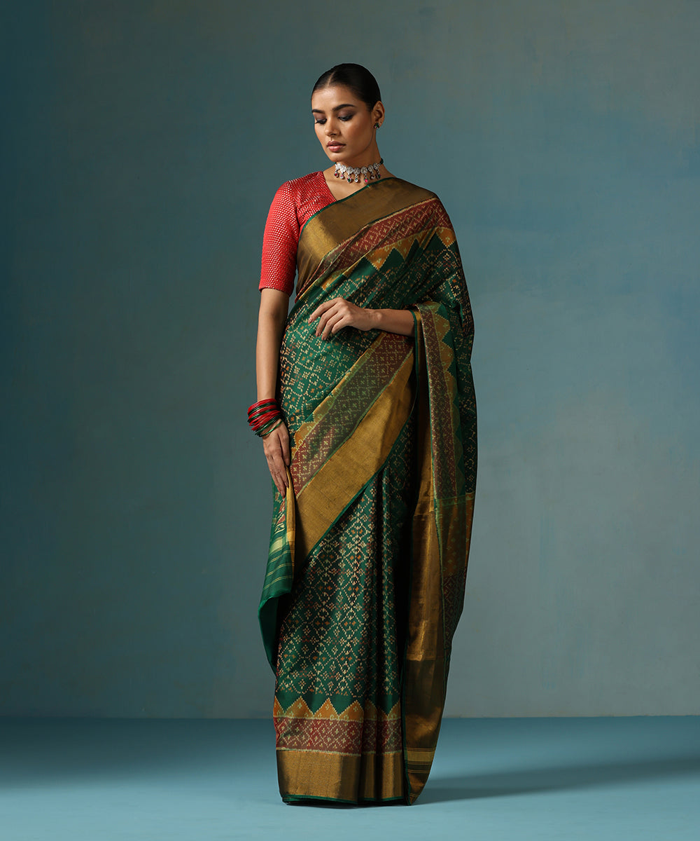 Handloom_Geen_Pure_Mulberry_Silk_Ikat_Patola_Saree_With_Gold_Zari_Border_WeaverStory_02