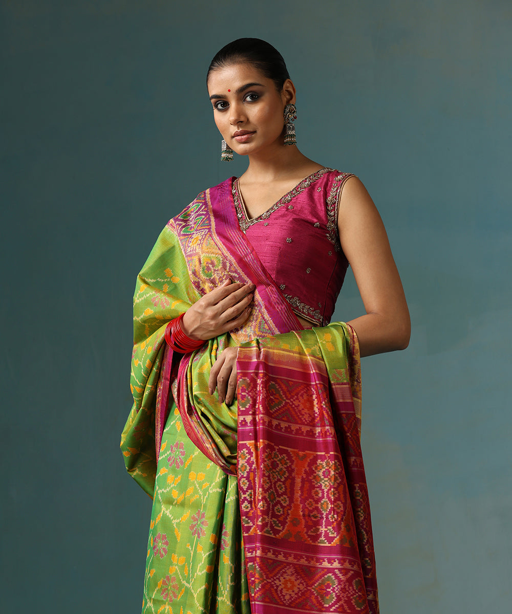 Parrot_Green_Handloom_Pure_Mulberry_Silk_Ikat_Patola_Saree_With_Tissue_Magenta_Border_WeaverStory_01