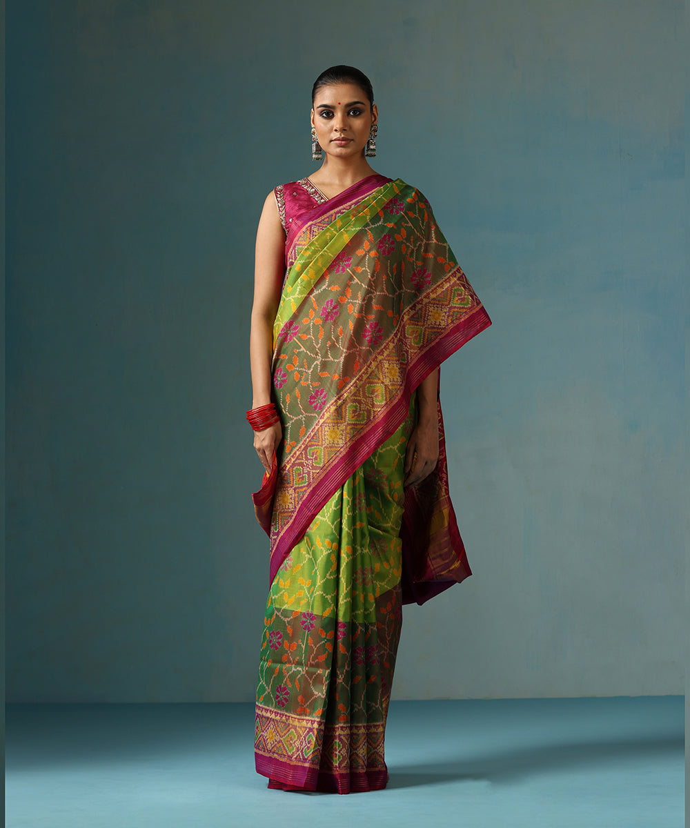 Parrot_Green_Handloom_Pure_Mulberry_Silk_Ikat_Patola_Saree_With_Tissue_Magenta_Border_WeaverStory_02